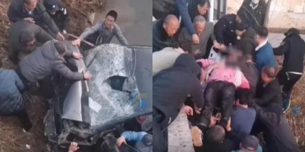 聊城市高唐县一轿车失控坠河2人被困，20余名村民搭人梯生死救援